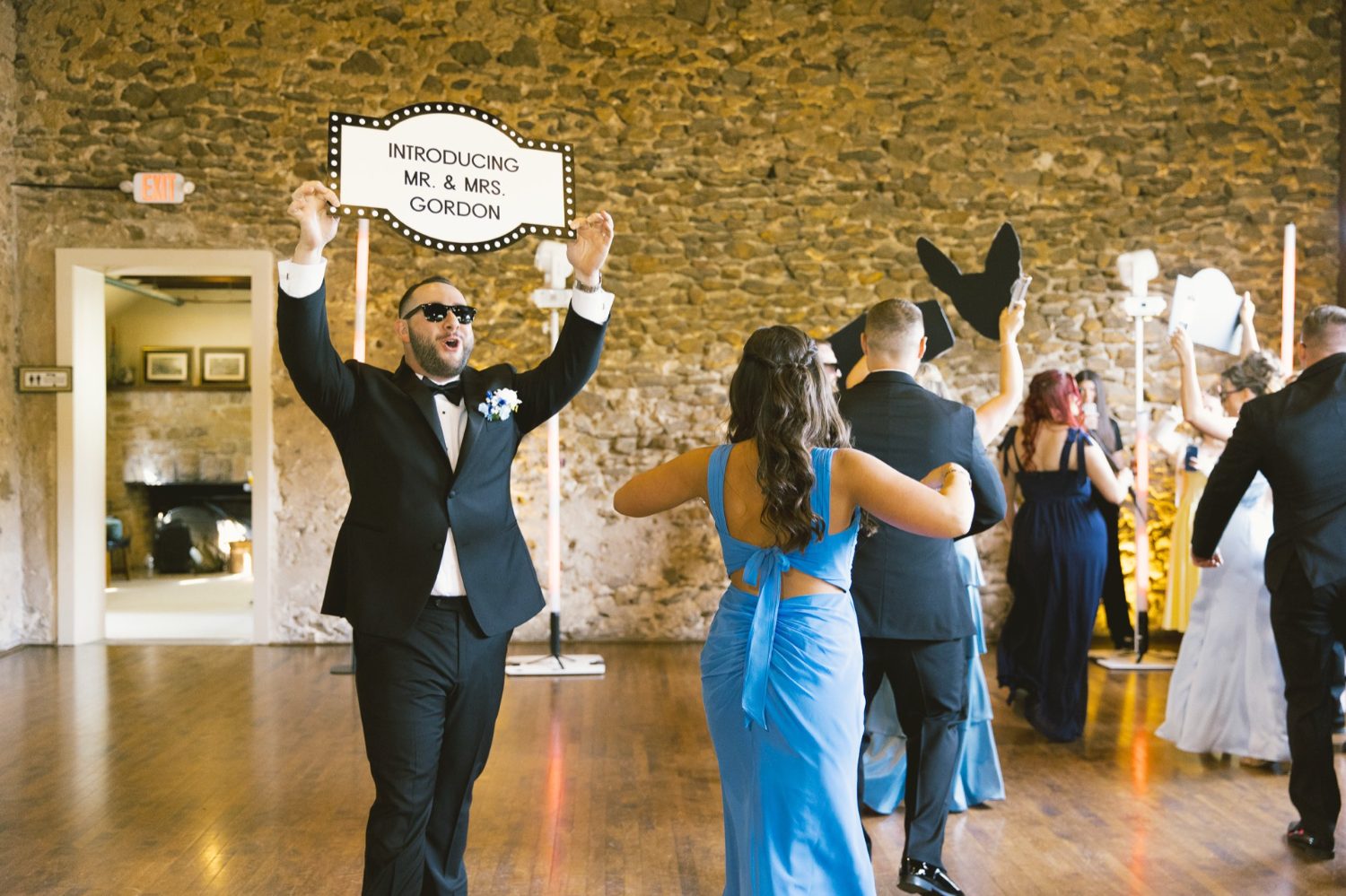 DJ Dave Gordon hyping a grand entrance at an Accent wedding