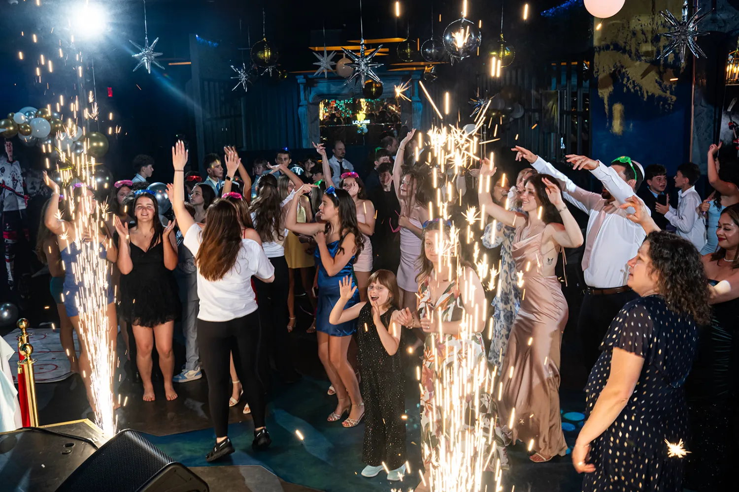 Israeli flags waving on the dance floor at The Place Restaurant